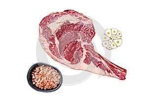 Raw uncooked dry aged beef tomahawk or rib eye steak. Isolated, white background.