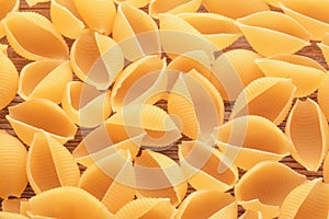 Raw uncooked pasta on table