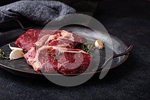 Raw uncooked rib eye steak