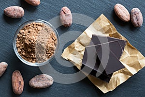 Raw unroasted cocoa powder, raw cacao nibs and chocolate