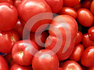 Raw vegetables: ripe juicy red tomatoes