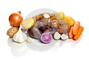 Raw vegetables - tubers - on white background