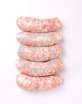 Raw white sausages, isolated on a white background. Meat product, Easter delicacy. A packshot photo, for package design.