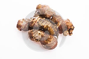 Raw Whole ans sliced Jerusalem artichokes