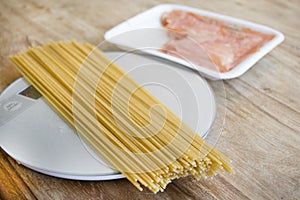 Raw wholemeal spaghetti and smoked salmon