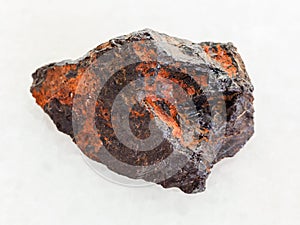 raw Wolframite stone (tungsten ore) on white