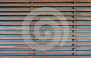 Raw wood, wooden slatted fence or lath wall background.