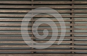 Raw wood, wooden slatted fence or lath wall background, vintage