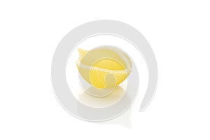 Raw yellow pasta conchiglie isolated on white