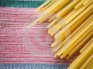 Raw yellow pasta spaghetti