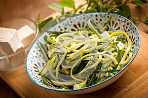 raw zucchinis salad with feta