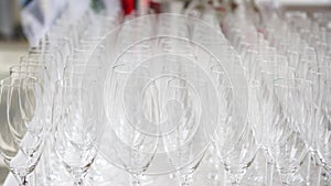 Raws of empty flutes at the wedding catering, 4K