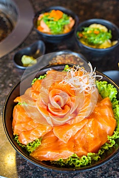 Raws salmon fillet on dish with wasabi in restaurant,Japanese food style