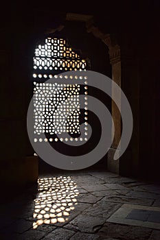 Ray of light entering through a window of Humayun`s tomb in Delhi photo