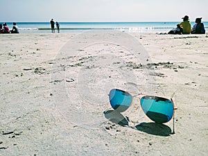 Rayban blue Aviator Sunglasses in beach sand at Havelock Island photo