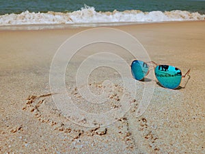 Rayban blue Aviator sunglasses at beaches with love sign