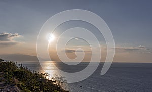 The rays of the evening sun are reflected on the sea horizon!