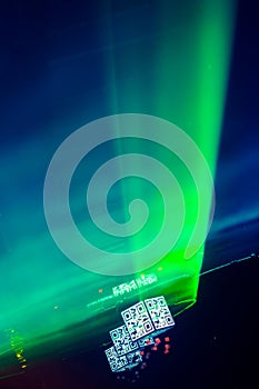 Rays of green laser light