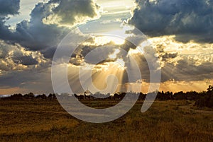 Rays of Sun through the Skies on Cemetery Background