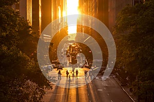 Rays of sunlight shining down on the people and traffic in Midtown Manhattan, New