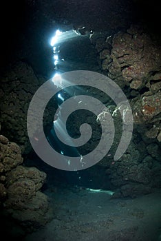 Rays of sunlight in an underwater cave.