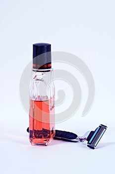 Razor and aftershave lotion photo