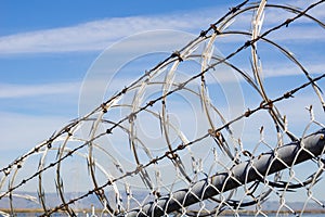 Razor barbed wire security fence, California