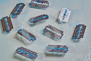 Razor blades with water droplets