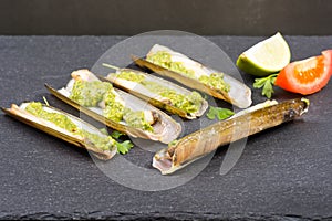 Razor clams - navajas - with green parsley pesto photo