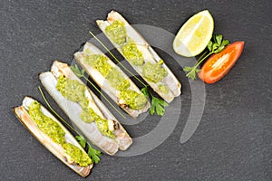 Razor clams - navajas - with green parsley pesto photo