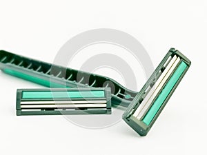 Razor with replaceable cassettes isolated on white background.