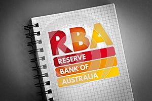 RBA - Reserve Bank of Australia acronym on notepad, business concept background