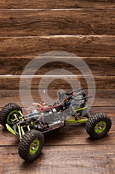 Rc car model toy on wooden background