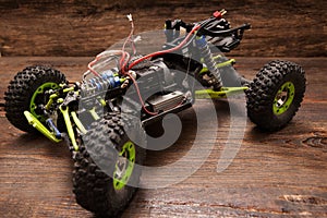Rc car model toy on wooden background