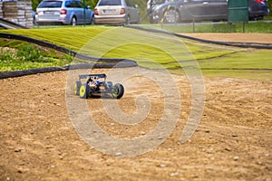 1/8 RC electric buggy drifting through a corner