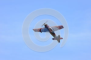 RC model airplane flying in the blue sky