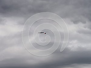 RC model of an airplane in the sky. Recreation and entertainment for children