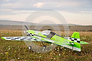 RC model green plane on runway