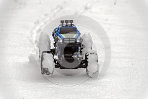 RC model speeding on the snow.