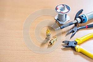 RCA jack and tool on the table