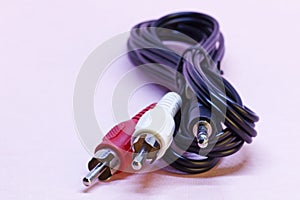 RCA phono cord is twisted together photo