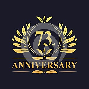 73rd Anniversary Design, luxurious golden color 73 years Anniversary logo. photo