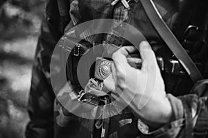 Re-enactor Dressed As World War II German Wehrmacht Soldier Holds His Hands On A Cartridge Belt. Details Of German