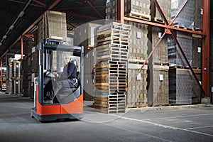 Reach truck driver in a warehouse