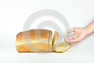 Reaching for bread.