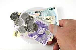 Reaching over swedish money