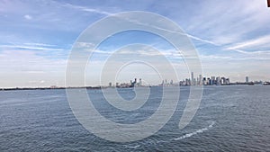 Reaching to New York Manhatten from sea. Close up of skyline of manhatten in new york from the staten island ferry