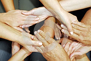 Reaching and touching hands, non verbal communication photo