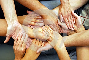 Reaching and touching hands, non verbal communication photo