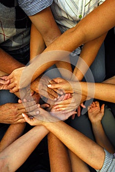 Reaching and touching hands, non verbal communication photo